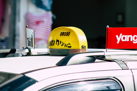Tel Aviv Israel June 16, 2019 View of traditional taxi rolling in the streets of Tel Aviv in the afternoonのeditorial素材