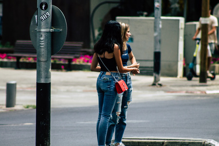 Tel Aviv Israel June 16, 2019 View of unknown Israeli people walking in the streets of Tel Aviv in the afternoonのeditorial素材