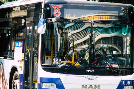 Tel Aviv Israel June 15, 2019 View of traditional city bus rolling in the streets of Tel Aviv in the afternoonのeditorial素材