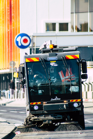 Tel Aviv Israel June 14, 2019 View of a green garbage truck rolling in the streets of Tel Aviv in the afternoonのeditorial素材