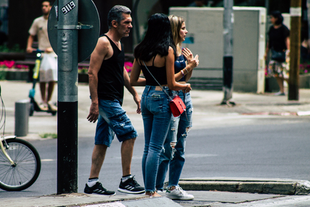 Tel Aviv Israel June 16, 2019 View of unknown Israeli people walking in the streets of Tel Aviv in the afternoonのeditorial素材