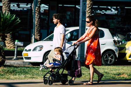 Tel Aviv Israel June 17, 2019 View of unknown Israeli people walking in the streets of Tel Aviv in the afternoonのeditorial素材