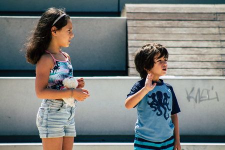 Tel Aviv Israel June 15, 2019 View of unknown Israeli children having fun on the beach of Tel Aviv in the afternoonのeditorial素材