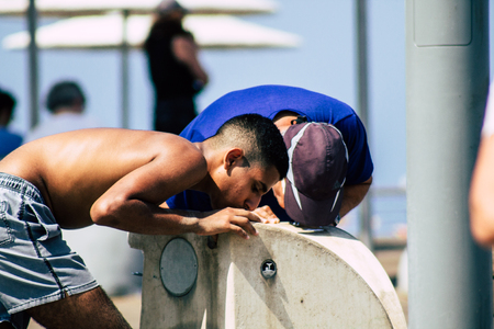 Tel Aviv Israel June 15, 2019 View of unknown Israeli people having fun on the beach of Tel Aviv in the afternoonのeditorial素材