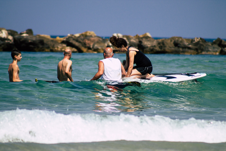 Tel Aviv Israel June 15, 2019 View of unknown Israeli people having fun on the beach of Tel Aviv in the afternoonのeditorial素材