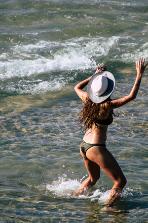 Tel Aviv Israel June 15, 2019 View of unknown Israeli people having fun on the beach of Tel Aviv in the afternoonのeditorial素材