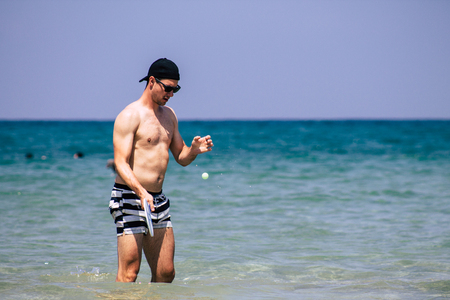 Tel Aviv Israel June 15, 2019 View of unknown Israeli people having fun on the beach of Tel Aviv in the afternoonのeditorial素材