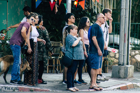Tel Aviv Israel June 17, 2019 View of unknown Israeli people walking in the streets of Tel Aviv in the afternoonのeditorial素材