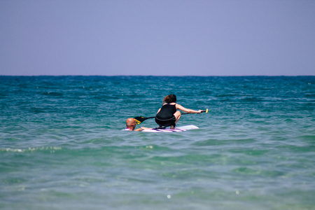 Tel Aviv Israel June 15, 2019 View of unknown Israeli people having fun on the beach of Tel Aviv in the afternoonのeditorial素材