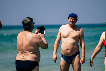 Tel Aviv Israel June 15, 2019 View of unknown Israeli people having fun on the beach of Tel Aviv in the afternoonのeditorial素材