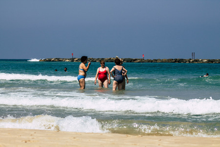 Tel Aviv Israel June 15, 2019 View of unknown Israeli people having fun on the beach of Tel Aviv in the afternoonのeditorial素材