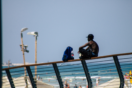 Tel Aviv Israel June 15, 2019 View of unknown Israeli people having fun on the beach of Tel Aviv in the afternoonのeditorial素材