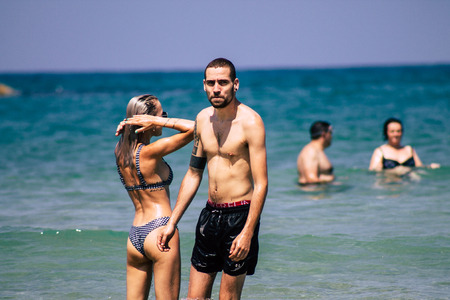 Tel Aviv Israel June 15, 2019 View of unknown Israeli people having fun on the beach of Tel Aviv in the afternoonのeditorial素材