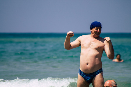 Tel Aviv Israel June 15, 2019 View of unknown Israeli people having fun on the beach of Tel Aviv in the afternoonのeditorial素材