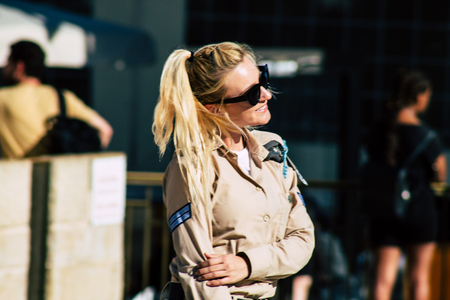 Jerusalem Israel June 19, 2019 View of young Israeli woman soldier having fun front the Western wall at the Old city of Jerusalem in the afternoonのeditorial素材