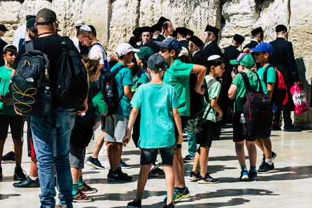 Jerusalem Israel June 19, 2019 View of young Israeli kid praying at the Western wall in the Old city of Jerusalem in the afternoonのeditorial素材