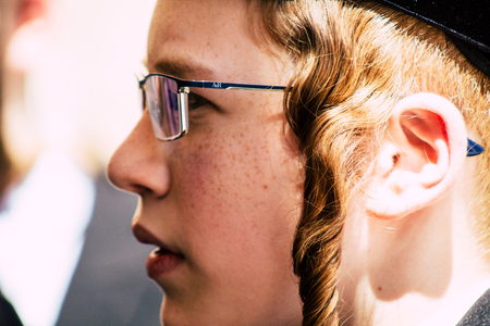 Jerusalem Israel June 19, 2019 View of unknown orthodox Israeli man praying at the Western wall in the Old city of Jerusalem in the afternoonのeditorial素材