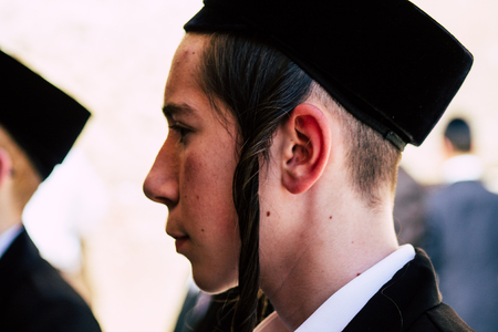 Jerusalem Israel June 19, 2019 View of unknown orthodox Israeli man praying at the Western wall in the Old city of Jerusalem in the afternoonのeditorial素材
