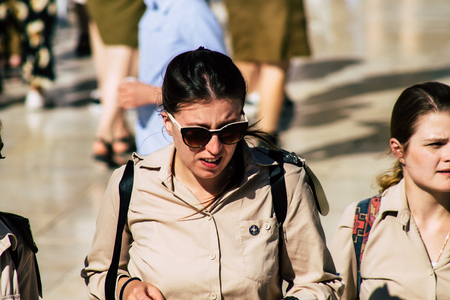 Jerusalem Israel June 19, 2019 View of young Israeli woman soldier having fun front the Western wall at the Old city of Jerusalem in the afternoonのeditorial素材