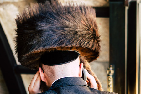 Jerusalem Israel June 19, 2019 View of unknown orthodox Israeli man praying at the Western wall in the Old city of Jerusalem in the afternoonのeditorial素材