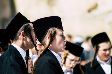 Jerusalem Israel June 19, 2019 View of unknown orthodox Israeli man dancing front the Western wall in the Old city of Jerusalem in the afternoonのeditorial素材