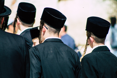 Jerusalem Israel June 19, 2019 View of unknown orthodox Israeli man dancing front the Western wall in the Old city of Jerusalem in the afternoonのeditorial素材