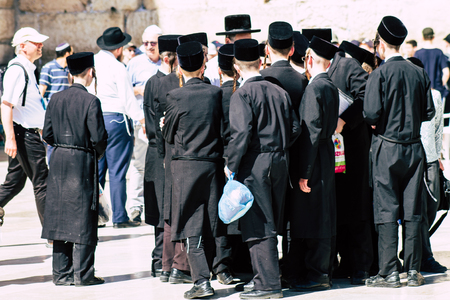 Jerusalem Israel June 19, 2019 View of unknown orthodox Israeli man praying at the Western wall in the Old city of Jerusalem in the afternoonのeditorial素材