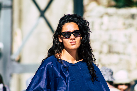 Jerusalem Israel June 19, 2019 View of unknown Israeli woman praying at the Western wall in the Old city of Jerusalem in the afternoonのeditorial素材