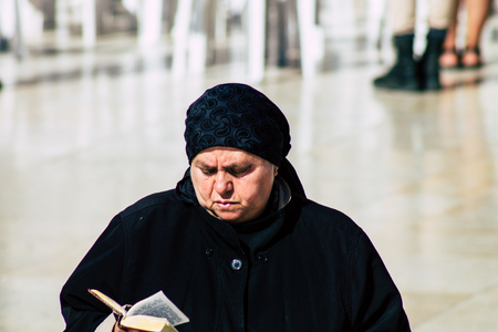Jerusalem Israel June 19, 2019 View of unknown Israeli woman praying at the Western wall in the Old city of Jerusalem in the afternoonのeditorial素材