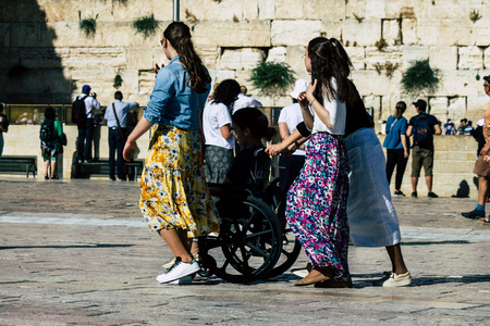 Jerusalem Israel June 19, 2019 View of unknown Israeli woman praying at the Western wall in the Old city of Jerusalem in the afternoonのeditorial素材