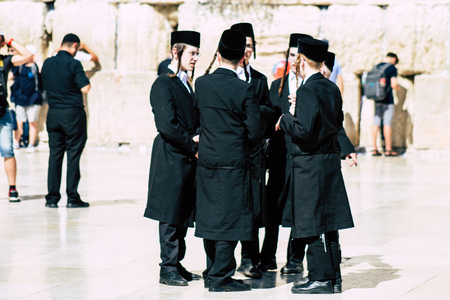 Jerusalem Israel June 19, 2019 View of unknown orthodox Israeli man praying at the Western wall in the Old city of Jerusalem in the afternoonのeditorial素材