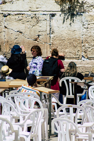 Jerusalem Israel June 19, 2019 View of unknown Israeli woman praying at the Western wall in the Old city of Jerusalem in the afternoonのeditorial素材