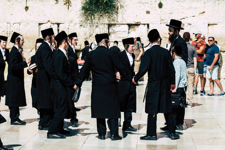 Jerusalem Israel June 19, 2019 View of unknown orthodox Israeli man praying at the Western wall in the Old city of Jerusalem in the afternoonのeditorial素材