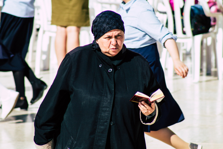 Jerusalem Israel June 19, 2019 View of unknown Israeli woman praying at the Western wall in the Old city of Jerusalem in the afternoonのeditorial素材