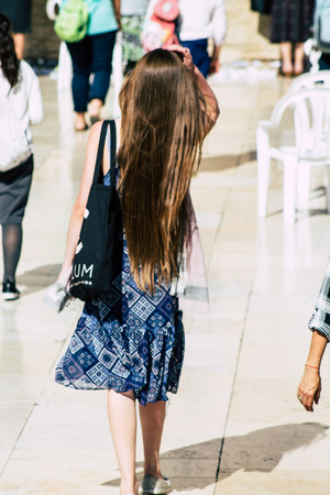 Jerusalem Israel June 19, 2019 View of unknown Israeli woman praying at the Western wall in the Old city of Jerusalem in the afternoonのeditorial素材