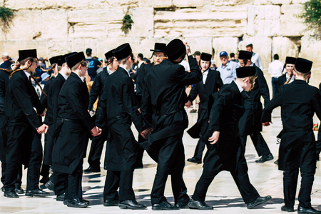 Jerusalem Israel June 19, 2019 View of unknown orthodox Israeli man dancing front the Western wall in the Old city of Jerusalem in the afternoonのeditorial素材