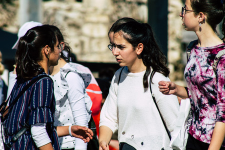 Jerusalem Israel June 19, 2019 View of young Israeli girl walking front the Western wall in the Old city of Jerusalem in the afternoonのeditorial素材