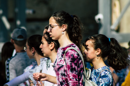 Jerusalem Israel June 19, 2019 View of young Israeli girl walking front the Western wall in the Old city of Jerusalem in the afternoonのeditorial素材