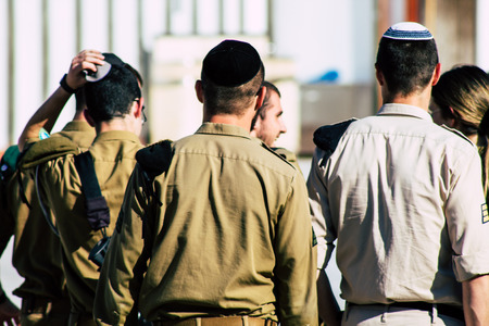 Jerusalem Israel June 19, 2019 View of Israeli soldier visiting the Western wall at the Old city of Jerusalem in the afternoonのeditorial素材