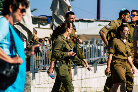 Jerusalem Israel June 19, 2019 View of Israeli soldier visiting the Western wall at the Old city of Jerusalem in the afternoonのeditorial素材