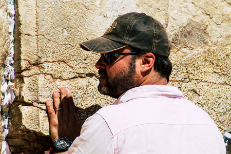 Jerusalem Israel June 19, 2019 View of unknown people praying at the Western wall in the Old city of Jerusalem in the afternoonのeditorial素材