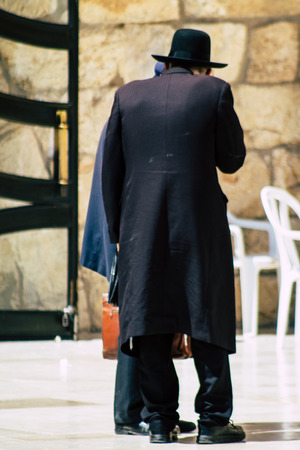Jerusalem Israel June 19, 2019 View of unknown people praying at the Western wall in the Old city of Jerusalem in the afternoonのeditorial素材