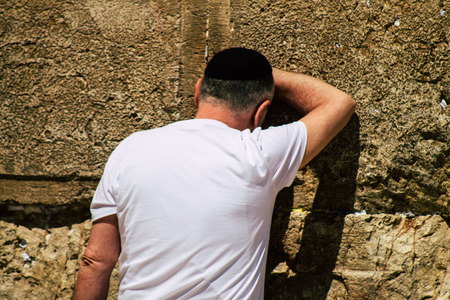 Jerusalem Israel June 19, 2019 View of unknown people praying at the Western wall in the Old city of Jerusalem in the afternoonのeditorial素材