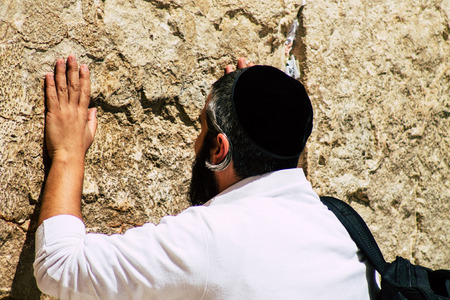 Jerusalem Israel June 19, 2019 View of unknown people praying at the Western wall in the Old city of Jerusalem in the afternoonのeditorial素材