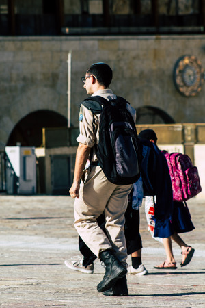 Jerusalem Israel June 19, 2019 View of Israeli soldier visiting the Western wall at the Old city of Jerusalem in the afternoonのeditorial素材