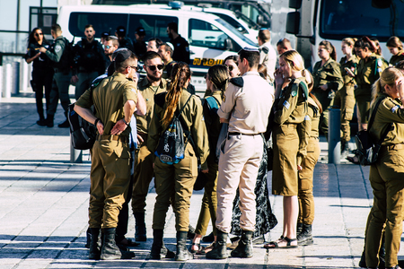 Jerusalem Israel June 19, 2019 View of Israeli soldier visiting the Western wall at the Old city of Jerusalem in the afternoonのeditorial素材
