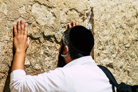 Jerusalem Israel June 19, 2019 View of unknown people praying at the Western wall in the Old city of Jerusalem in the afternoonのeditorial素材