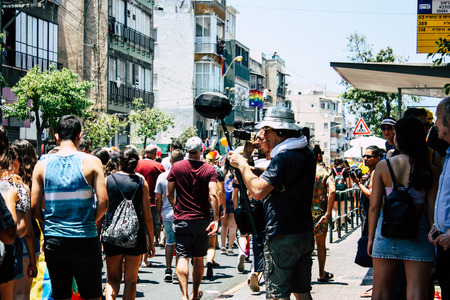 Tel Aviv Israel June 14, 2019 View of unknown Israeli people participating to the gay pride parade in the streets of Tel Aviv in the afternoonのeditorial素材