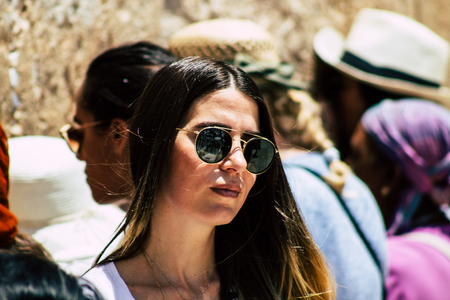 Jerusalem Israel June 24, 2019 View of unknown Israeli woman praying at the Western wall in the Old city of Jerusalem in the afternoonのeditorial素材