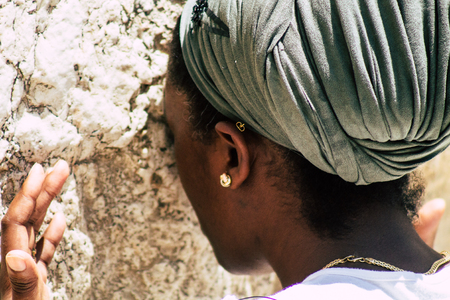 Jerusalem Israel June 24, 2019 View of unknown Israeli woman praying at the Western wall in the Old city of Jerusalem in the afternoonのeditorial素材